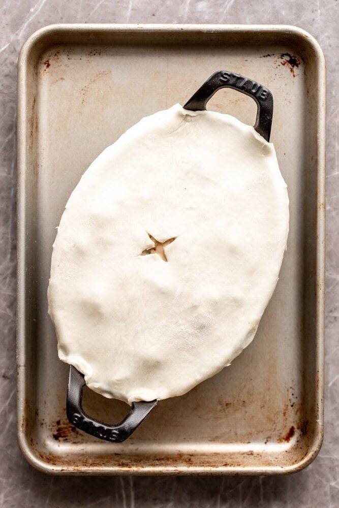 lobster pot pie topped with puff pastry with slash for steam.