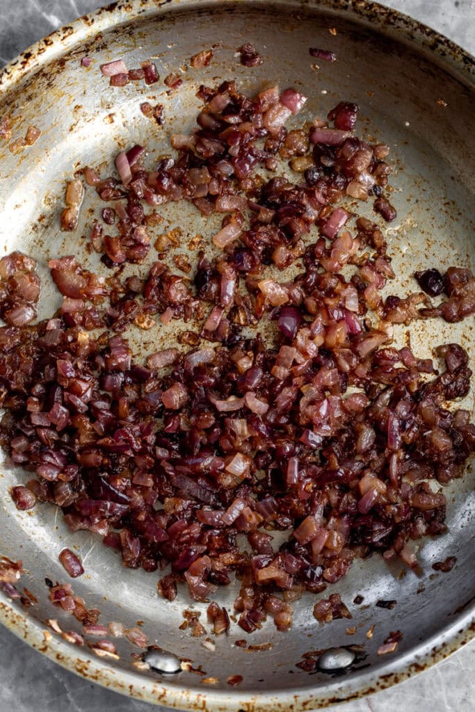caramelized red onions in sauté pan.