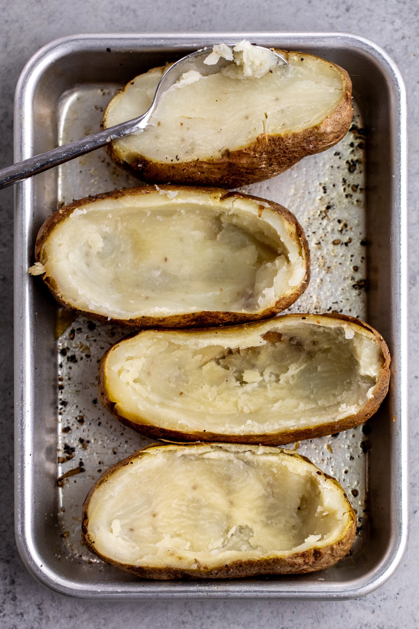 sliced and scooped baked potatoes for twice baked potatoes.