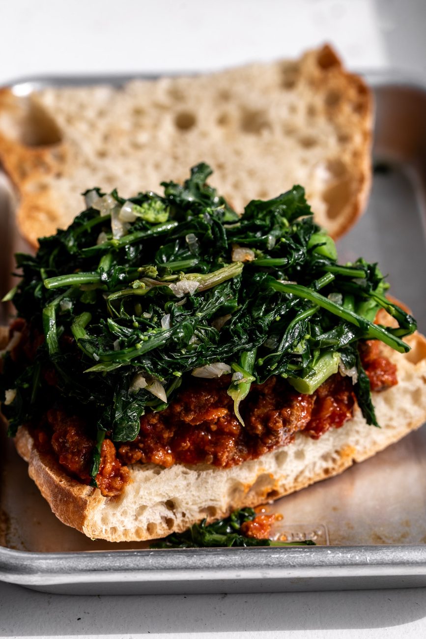 Italian sloppy joe sandwich with bolognese and sautéed rapini.