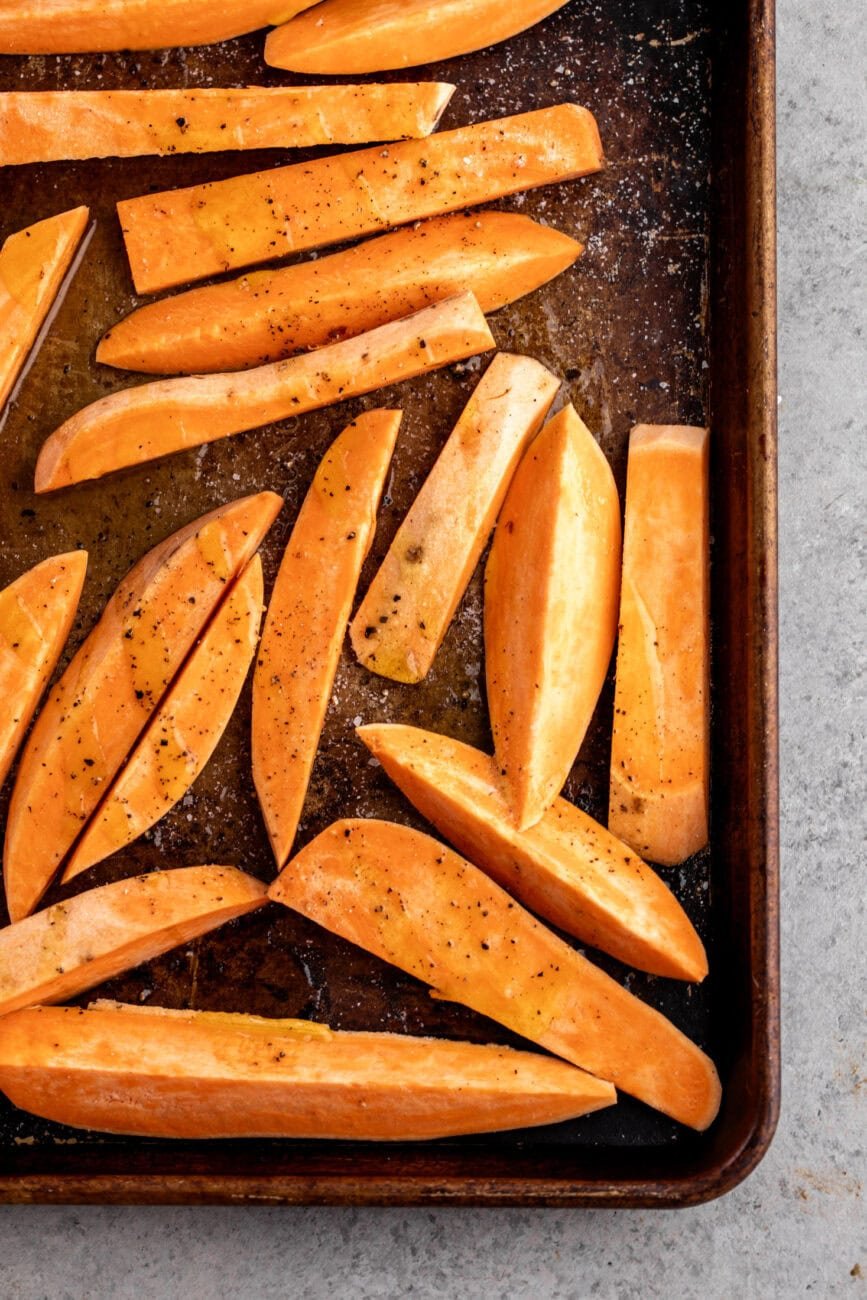 sweet potato spears on baking sheet.