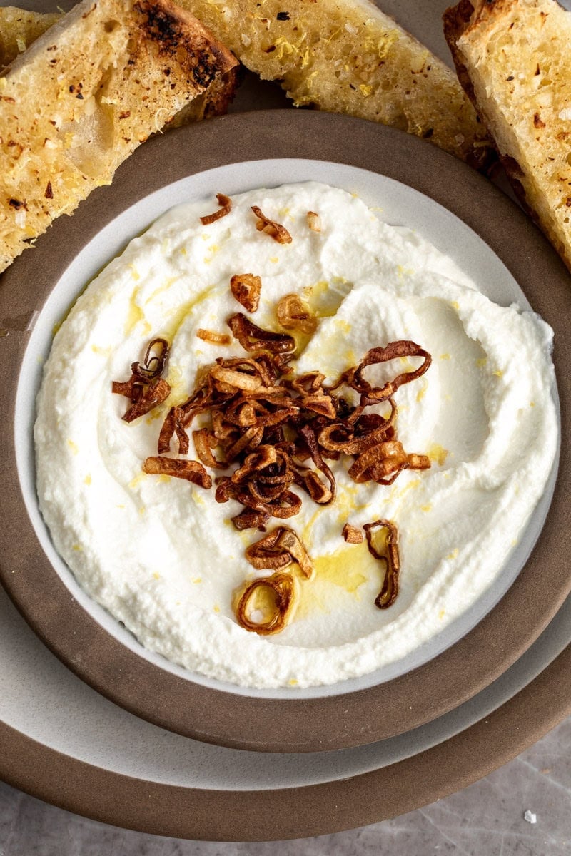 whipped pecorino dip topped with crispy fried shallots.