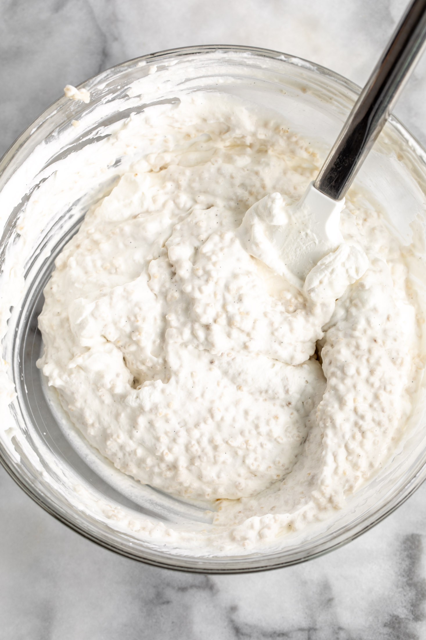 whipped cream folded into creamy millet pudding.