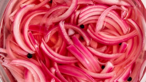 how to make pickled onions bright pink color in brine with peppercorns.