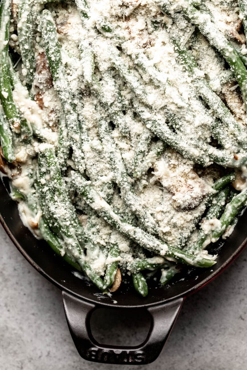 assembled green bean casserole with cheese.