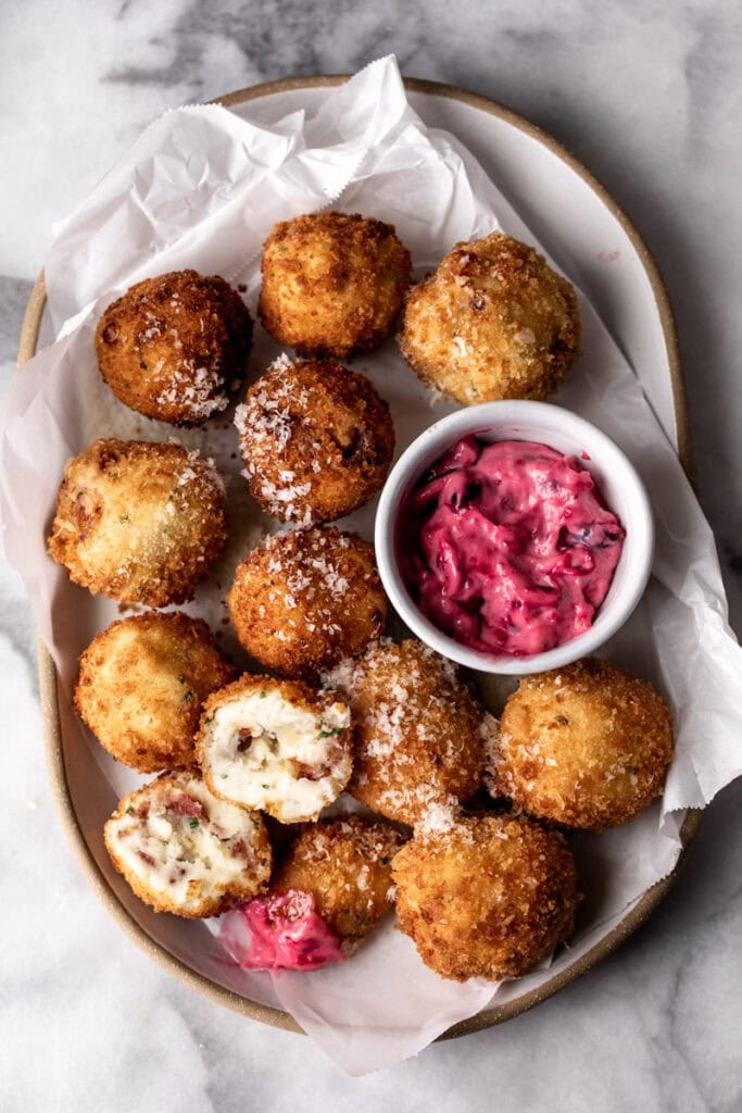 thanksgiving leftover mashed potato croquettes with cranberry mayo.