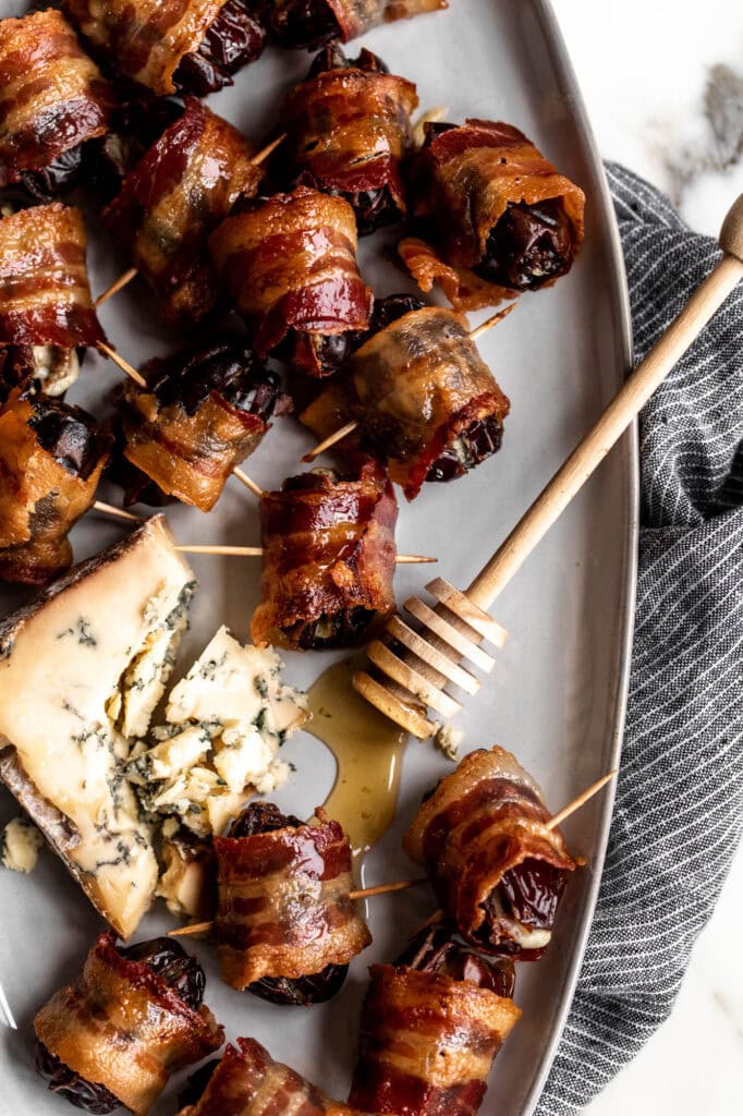 bacon wrapped dates stuffed with blue cheese.