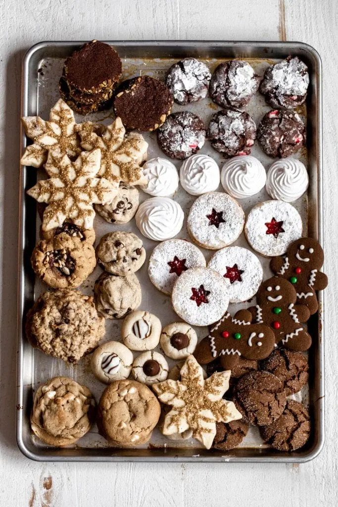 12 days of christmas cookies arranged on baking sheet
