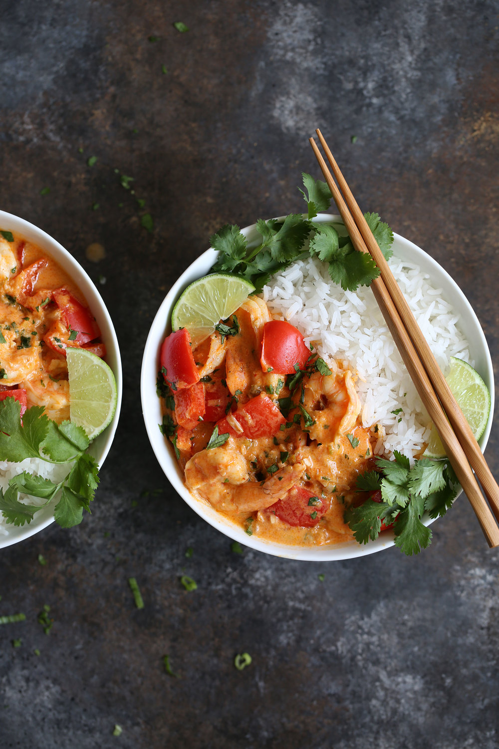 Thai Red Curry Shrimp with Jasmine Rice over jasmine rice with chopsticks