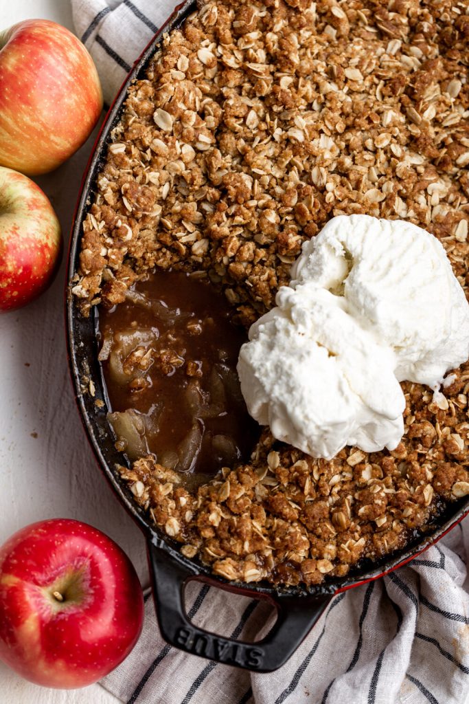 Apple crisp with sliced honeycrisp apples tossed in cinnamon sugar topped with a crumbly, oat topping