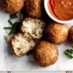 crispy cheese arancini with spicy marinara dipping sauce.