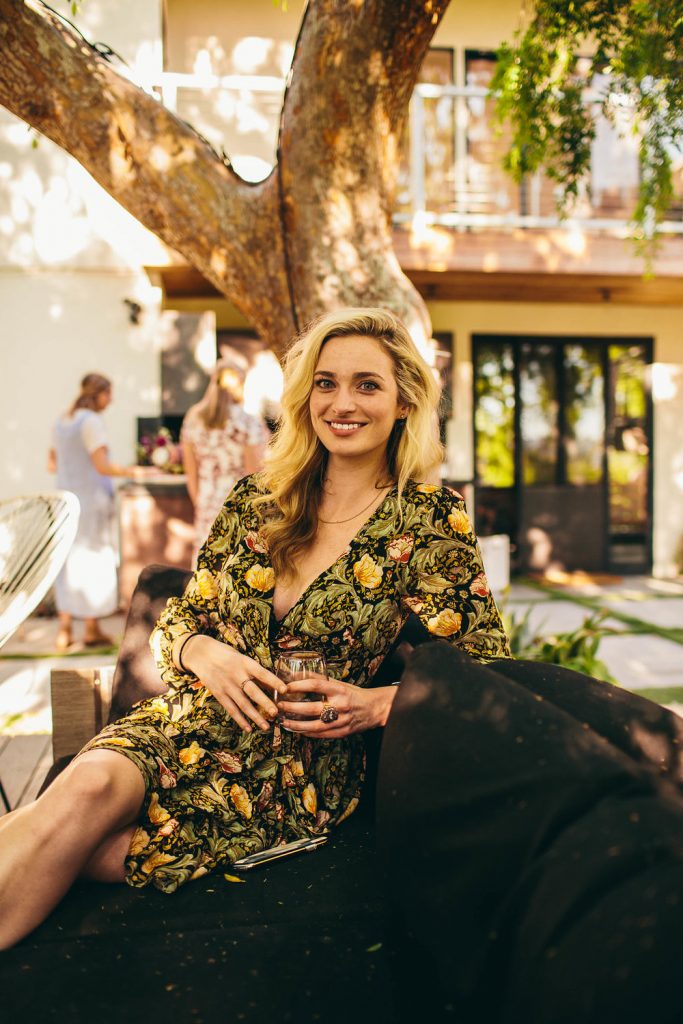 allegra edwards holding cocktail.