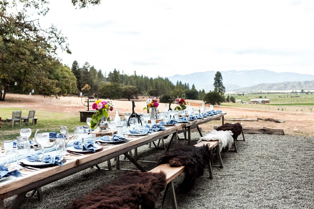 Five marys farm wood bench with sheepskin and table settings