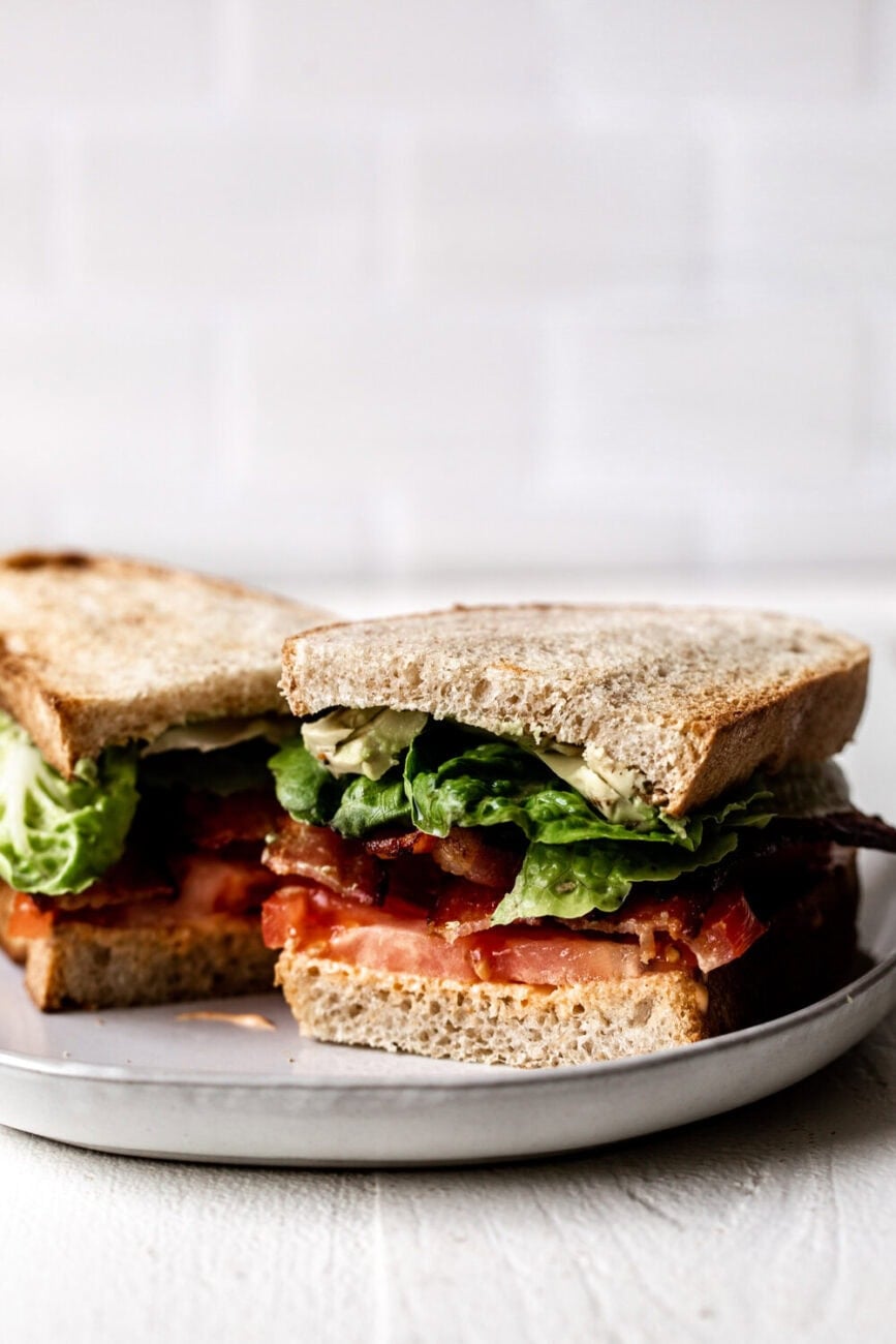 BLT with Spicy Mayo and Avocado on bread.