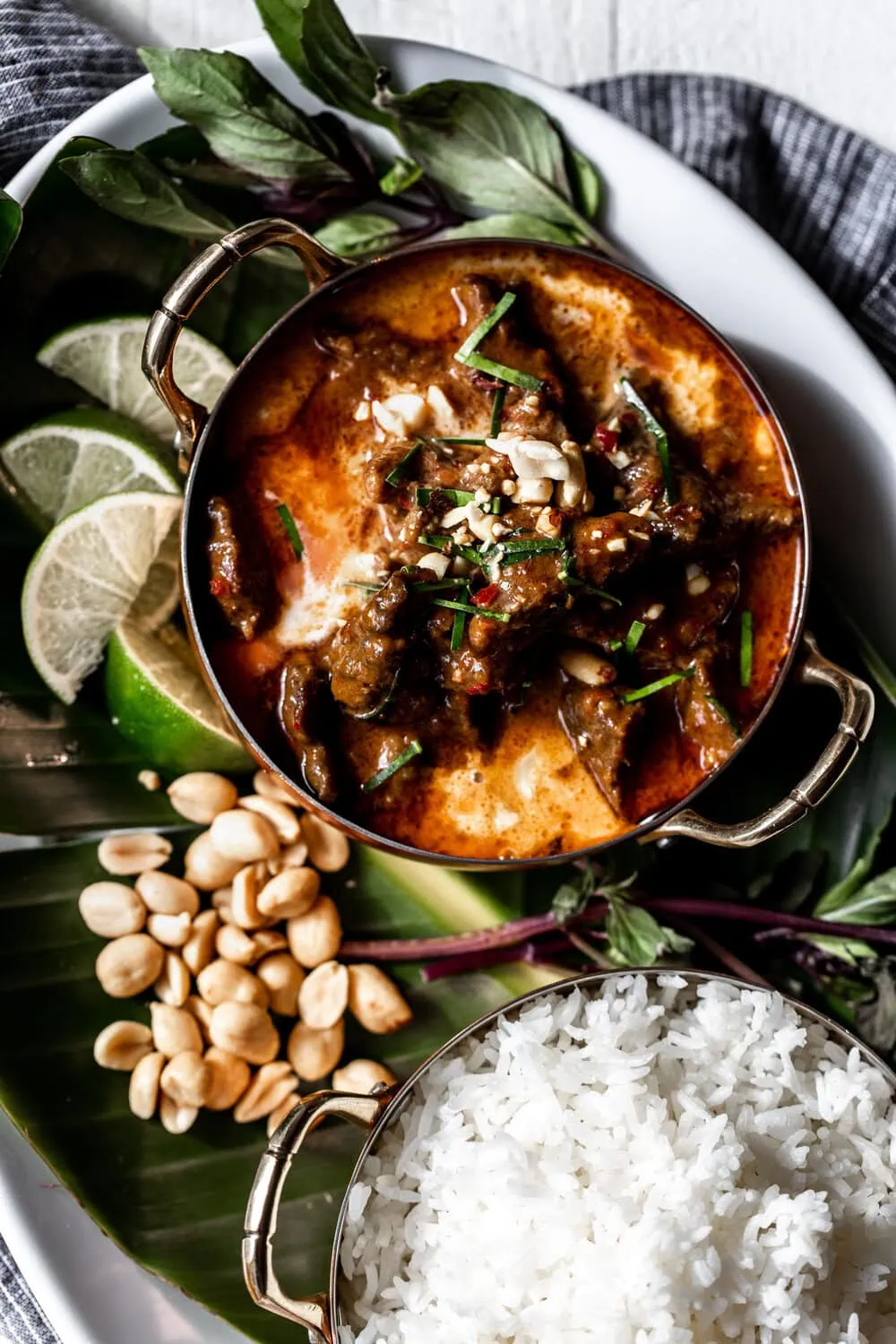 Beef Panang Curry topped with chopped peanuts and lime leaves