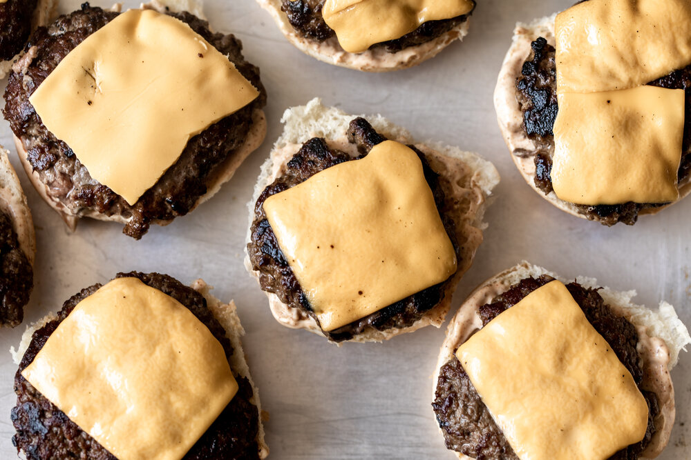 ground beef sliders with cheddar cheese melted