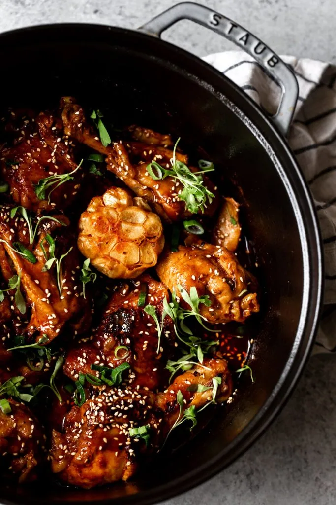 Braised Garlic Gochujang Chicken Legs in staub dutch oven