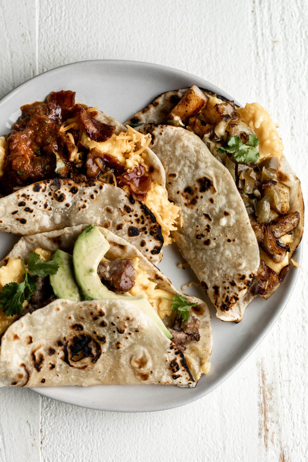 Breakfast taco bar with homemade tortillas made with potatoes, cheese bacon and susage