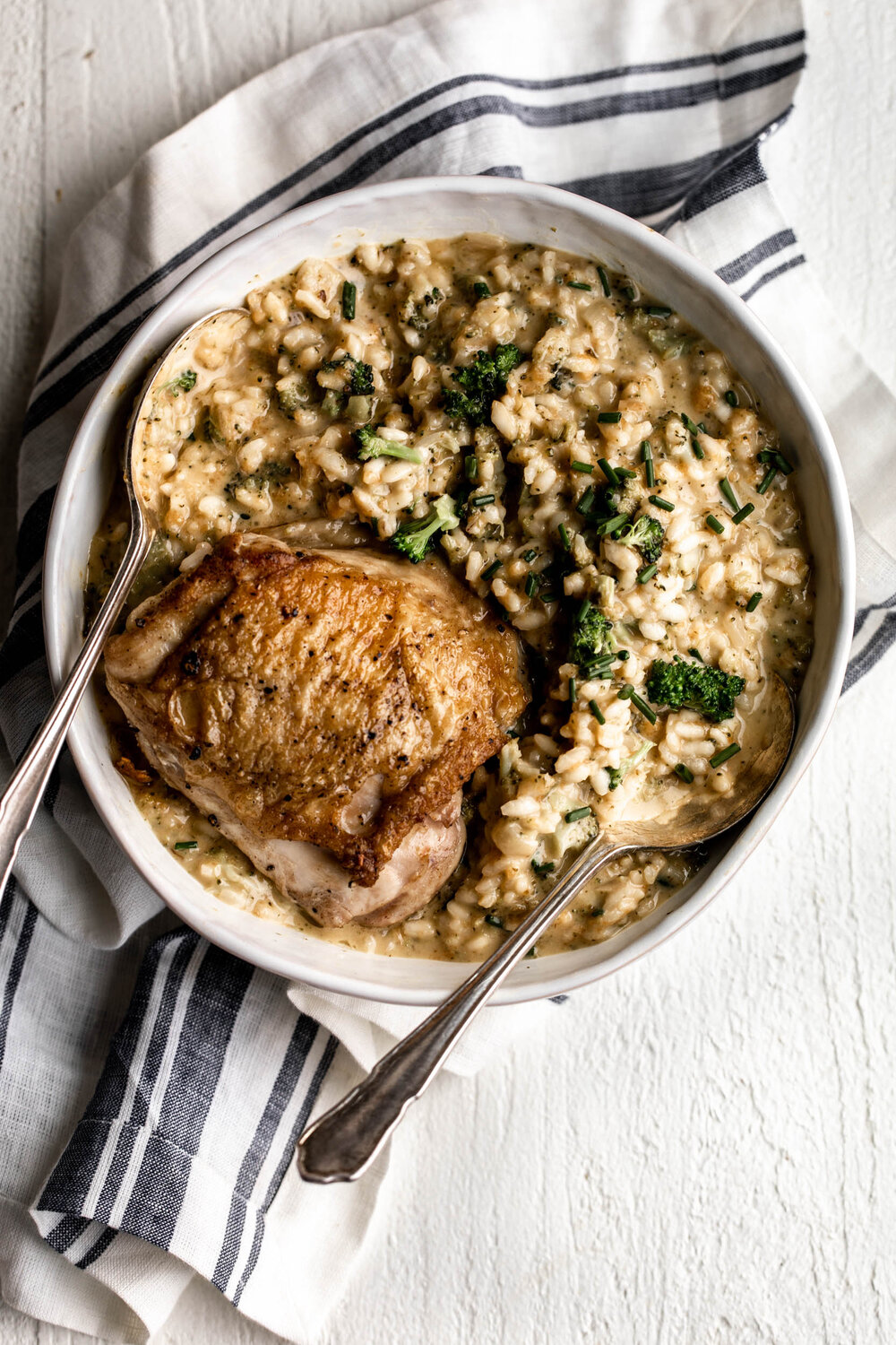 Broccoli cheddar risotto with crispy chicken thigh