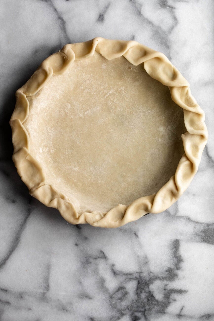 homemade pie crust crimped.