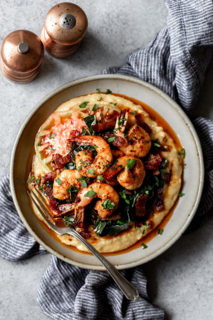 Cajun Shrimp with Cheesy Grits and Bacon Braised Collard Greens