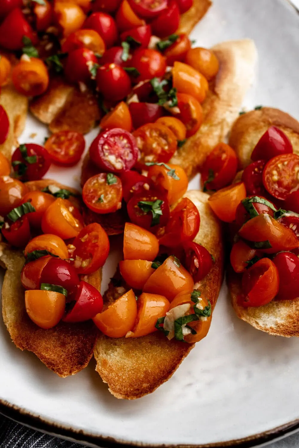 Cherry Tomato Naked Bruschetta Crostini on platter