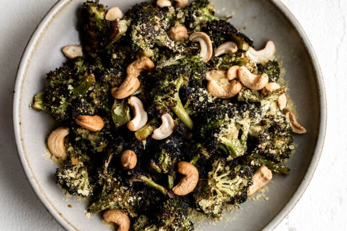 chili roasted broccoli with cashews and nutritional yeast.