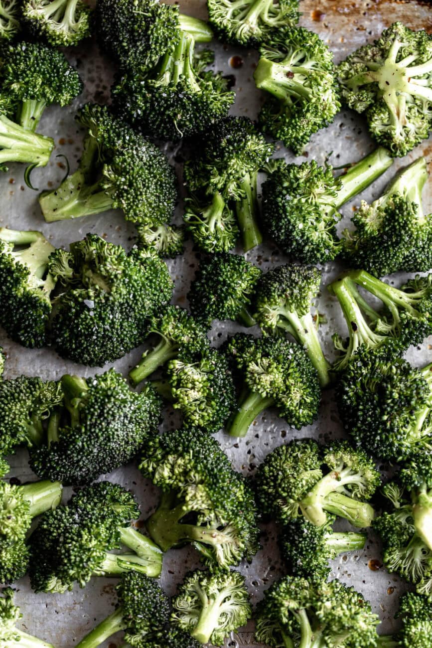 broccoli florets on baking sheet.