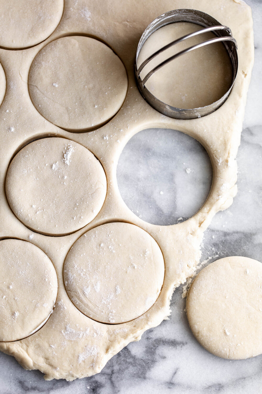 yeast doughnut dough with cookie cutter