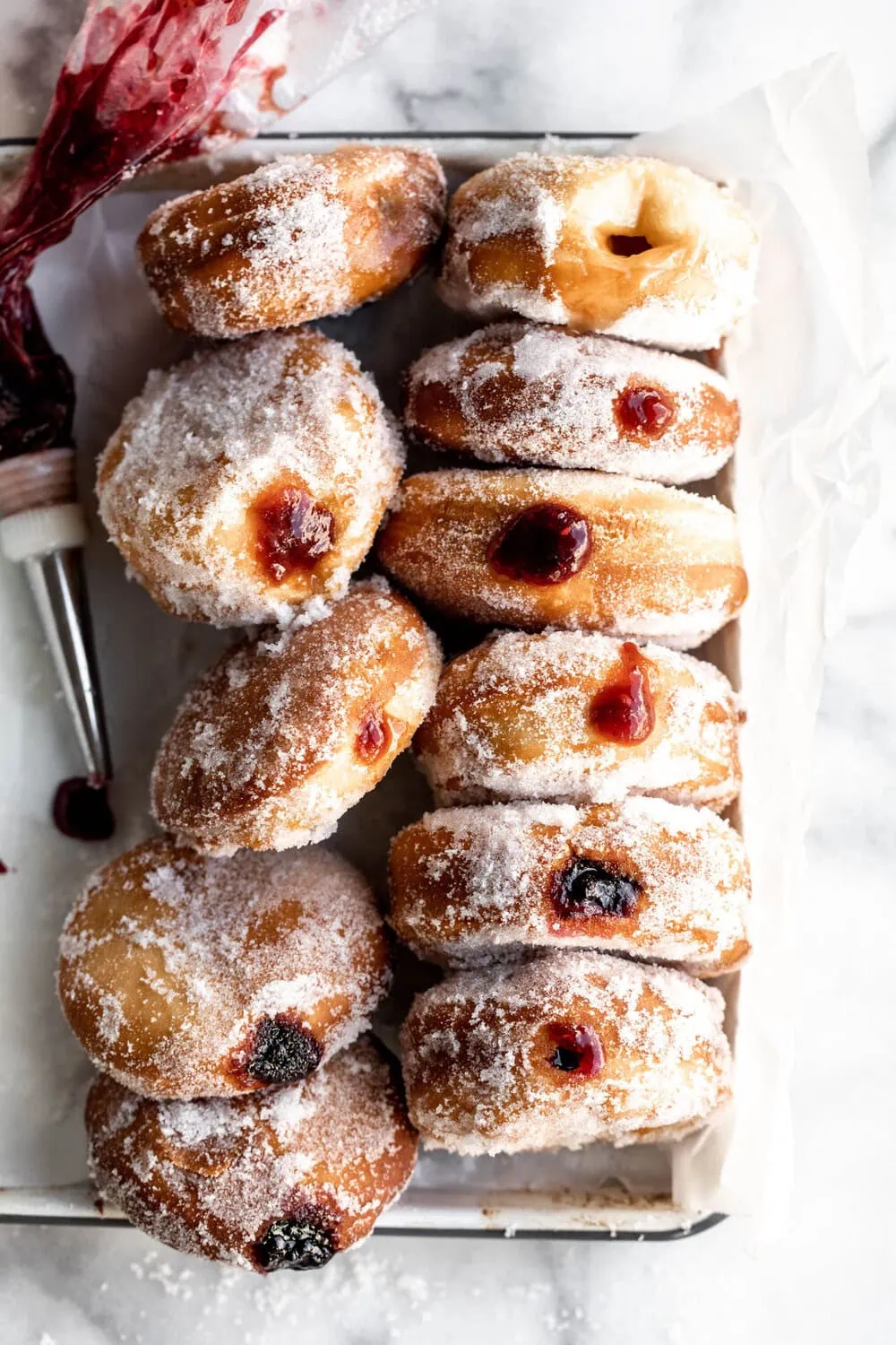 Classic Yeasty Jelly Filled Donuts with piping bag