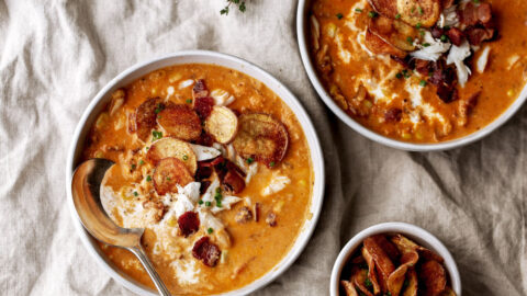 Corn and crab chowder topped with fingerling potato chips.