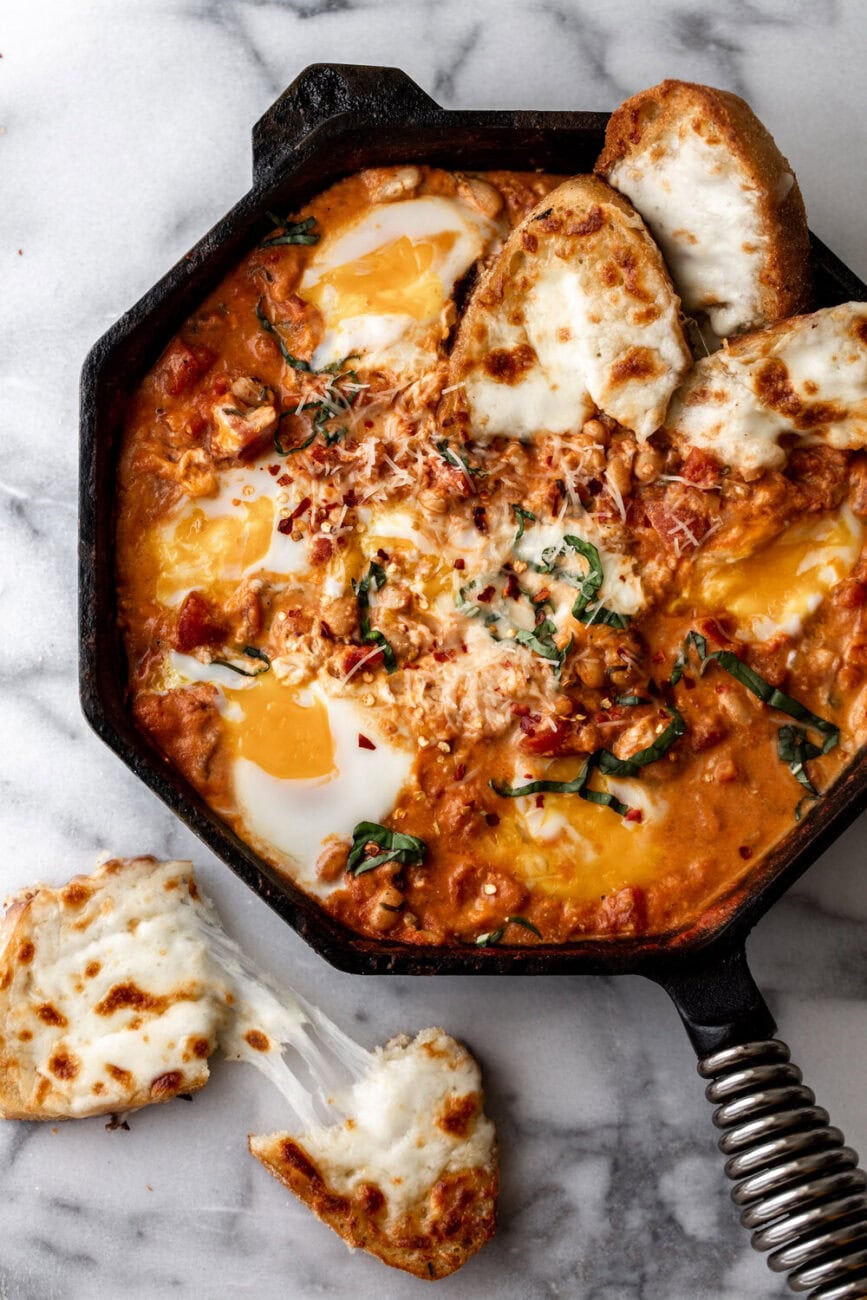 Creamy Italian Eggs in Purgatory with Shallow-fried cheesy Mozzarella Bread.