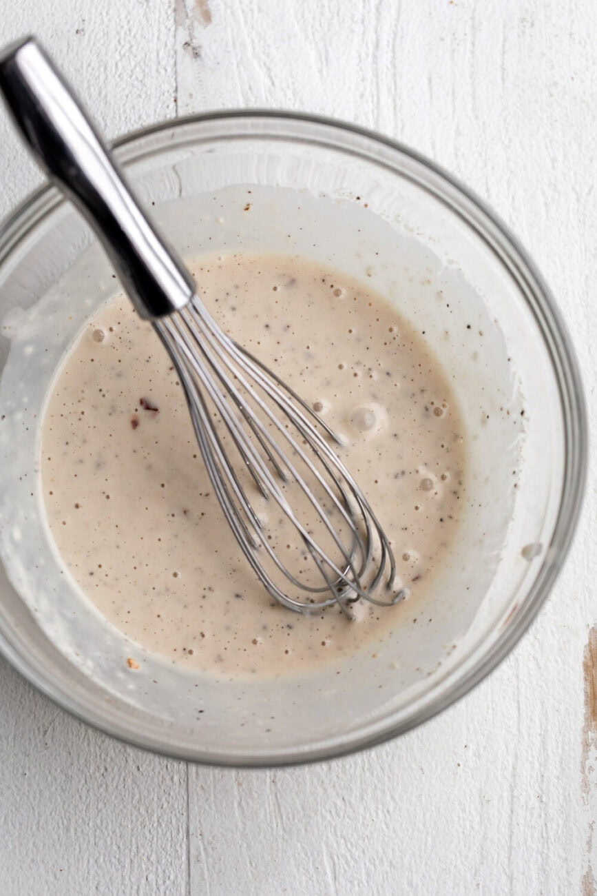 whisked Alabama white sauce.