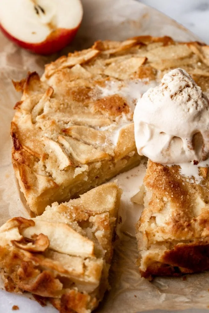 German Almond-Apple Butter Cake topped with vanilla ice cream.