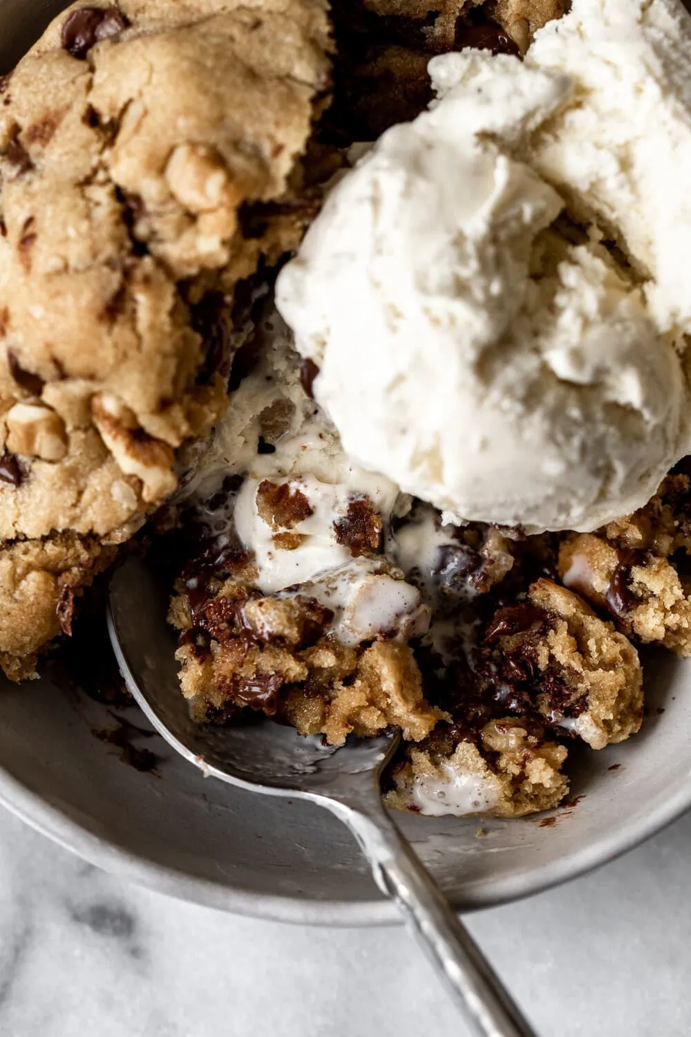 Giant Gooey Chocolate Chip Walnut Cookies with vanilla ice cream
