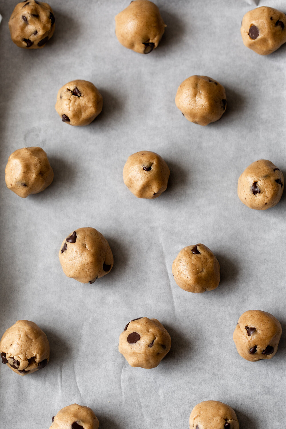 Chocolate Chip Cookie dough on baking sheet