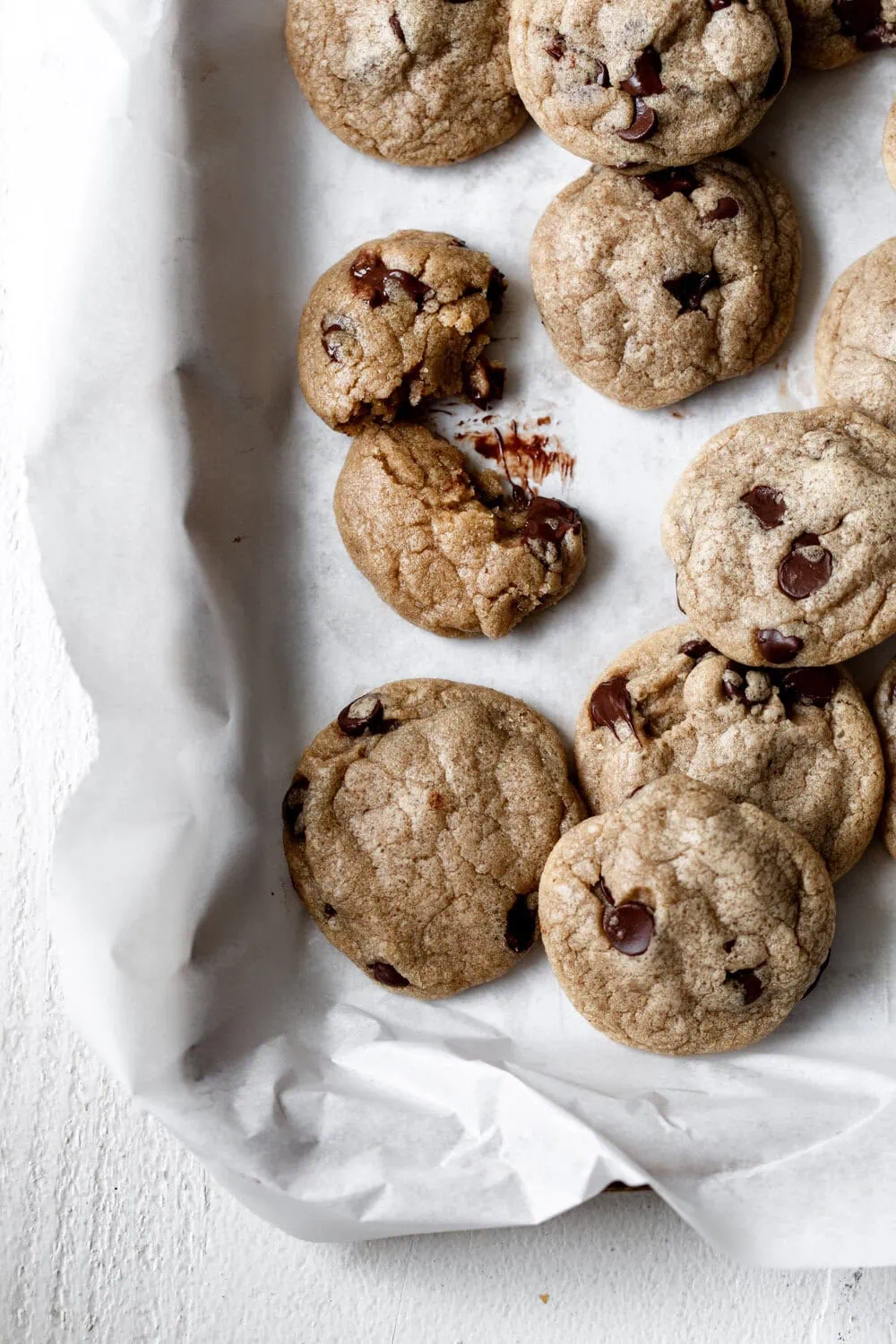 Grandma Mary's Chocolate Chip Cookies on parchment paper