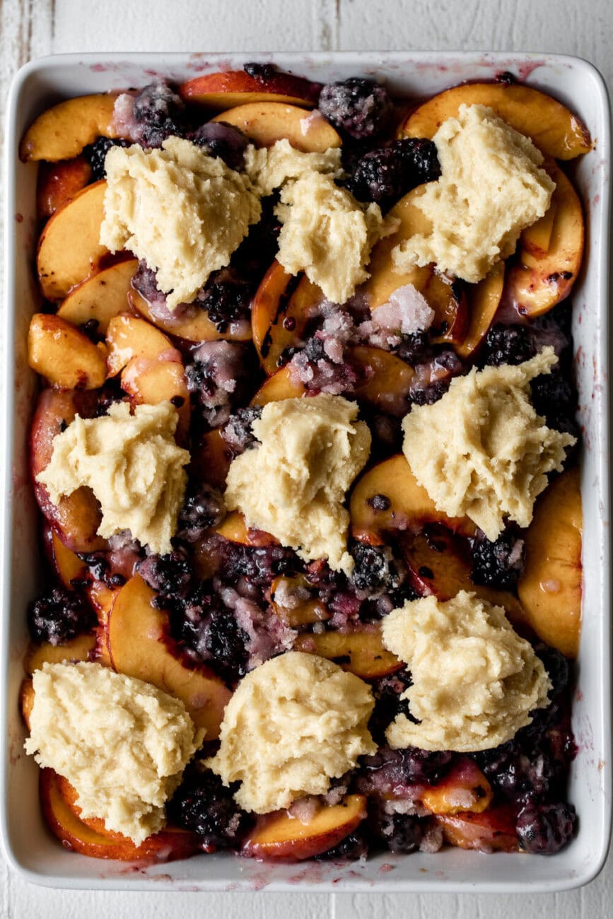 Grilled Peach and Blackberry Cobbler assembly.