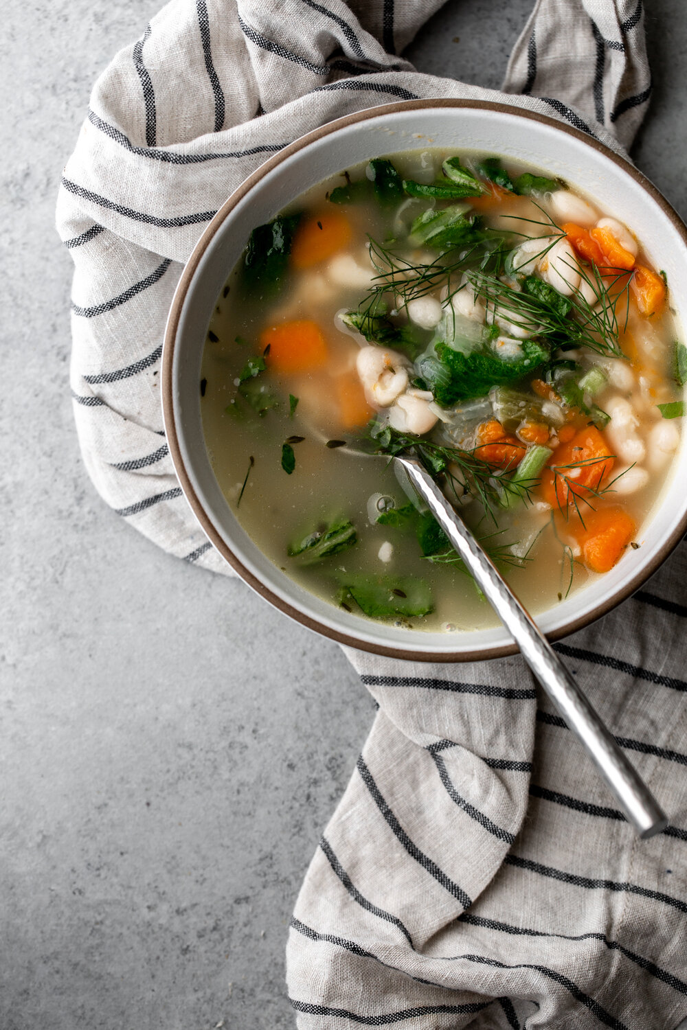 Ham Hock & White Bean Stew with Collard Greens bowl