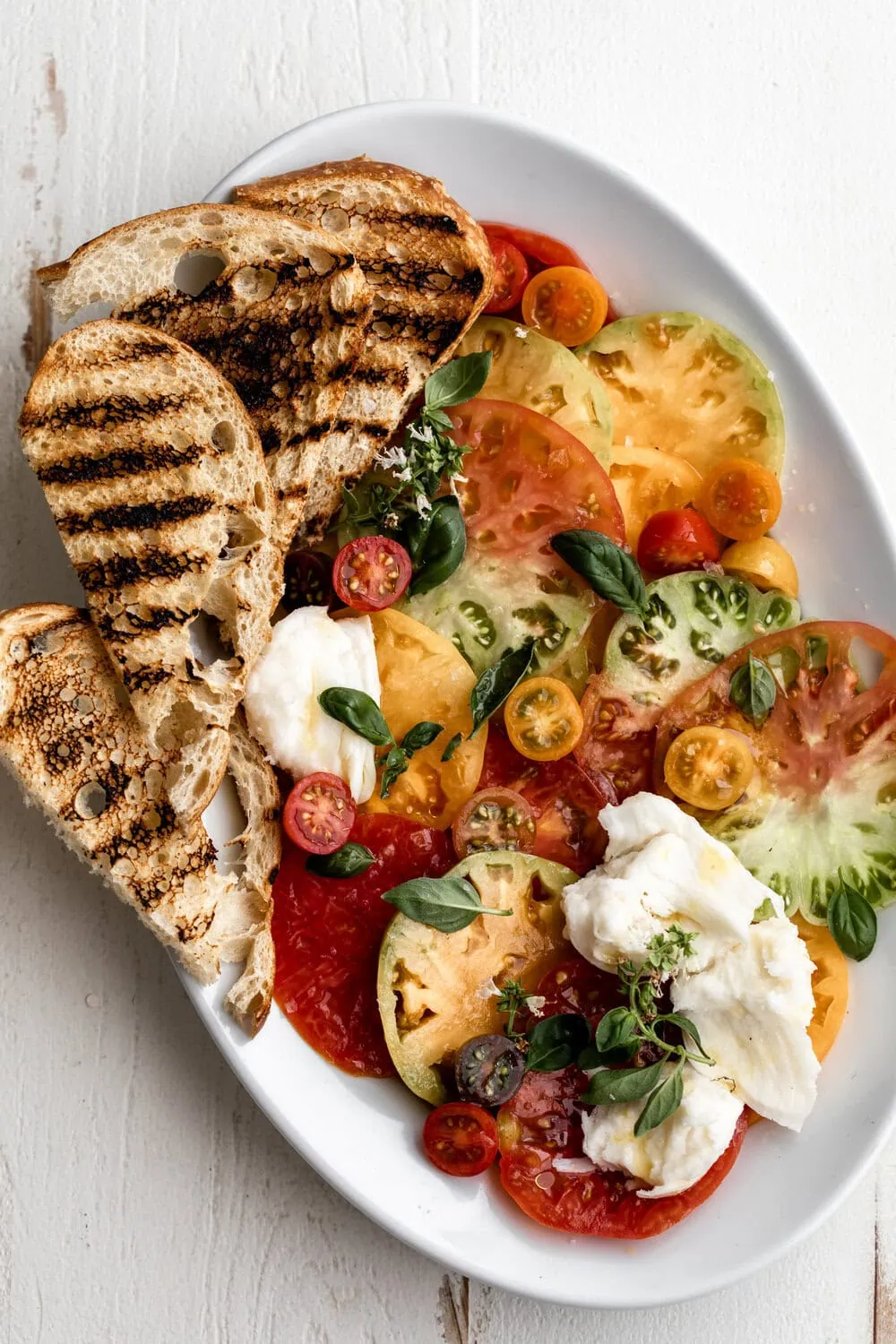 Heirloom Tomato Caprese Salad with  mozzarella and Grilled Bread
