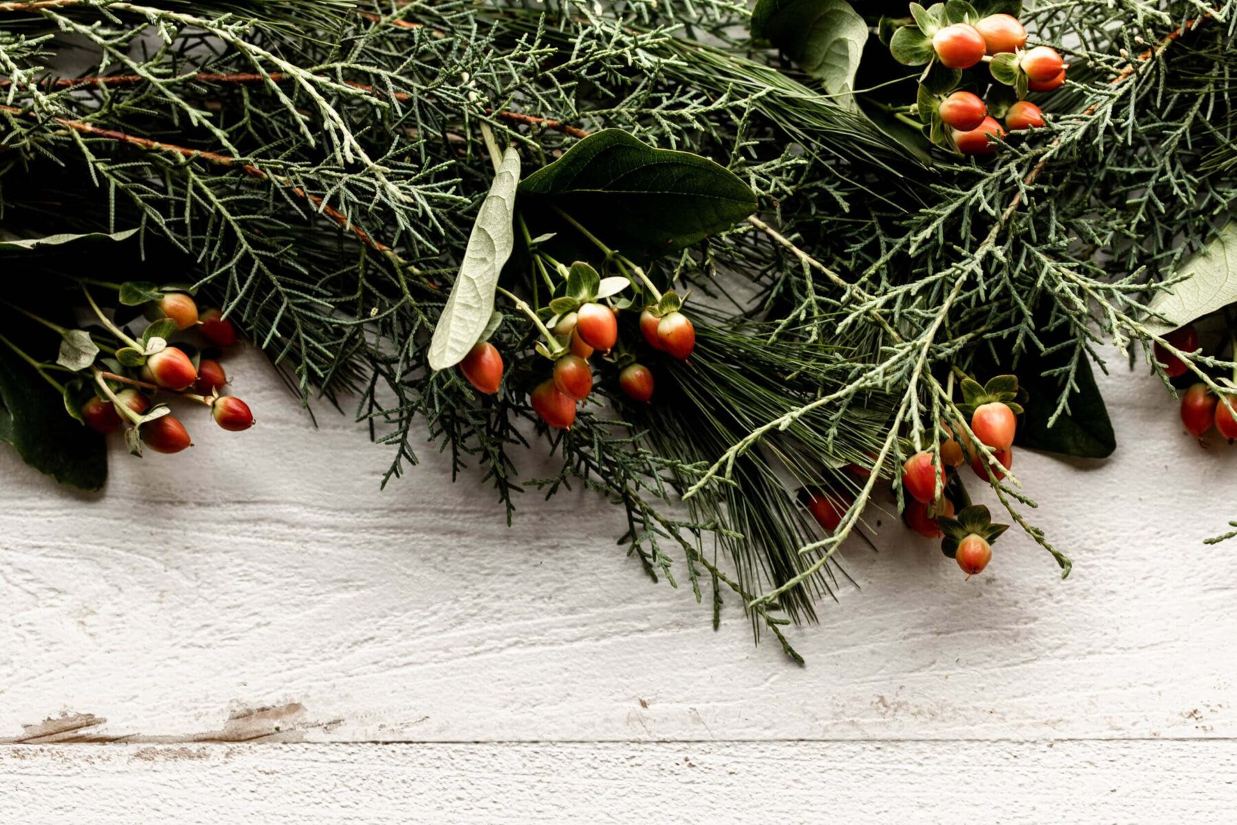 holiday garland with red berries.