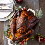 Chili rubbed roast turkey with oranges.