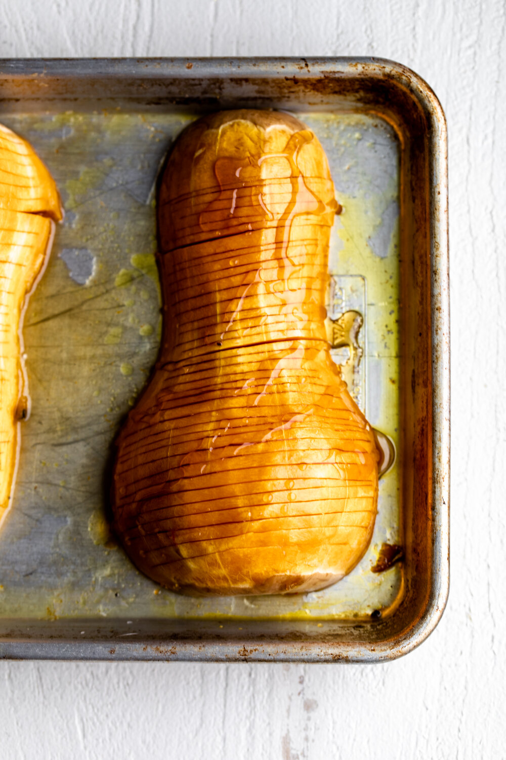thinly sliced hasselback butternut squash with honey 