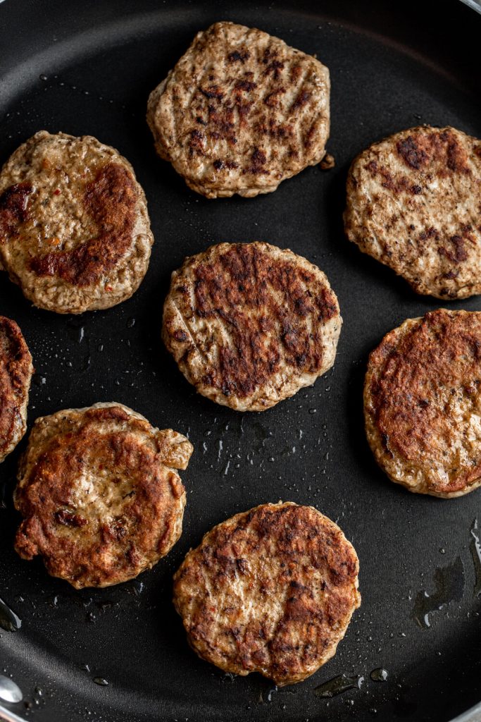 Turkey Sausage Sandwich with Gouda, Cranberry Mayo & Bacon Cooking