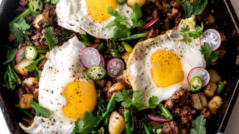 Lamb Hash with over easy eggs and broccolini.