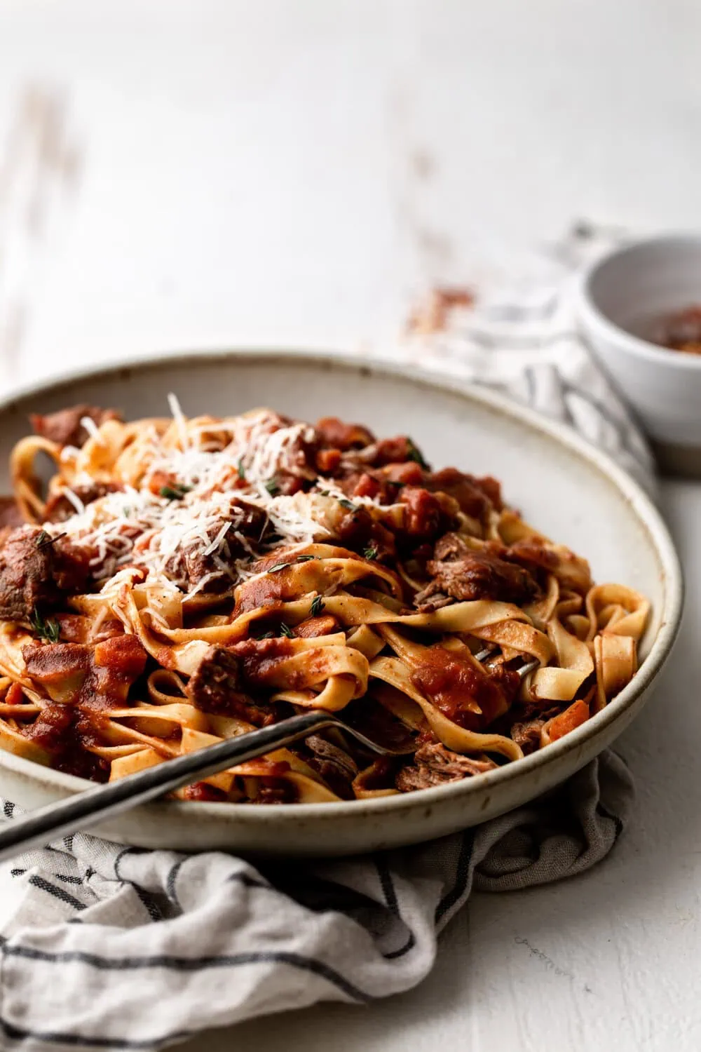 Lamb Ragu over tagliatelle with fork