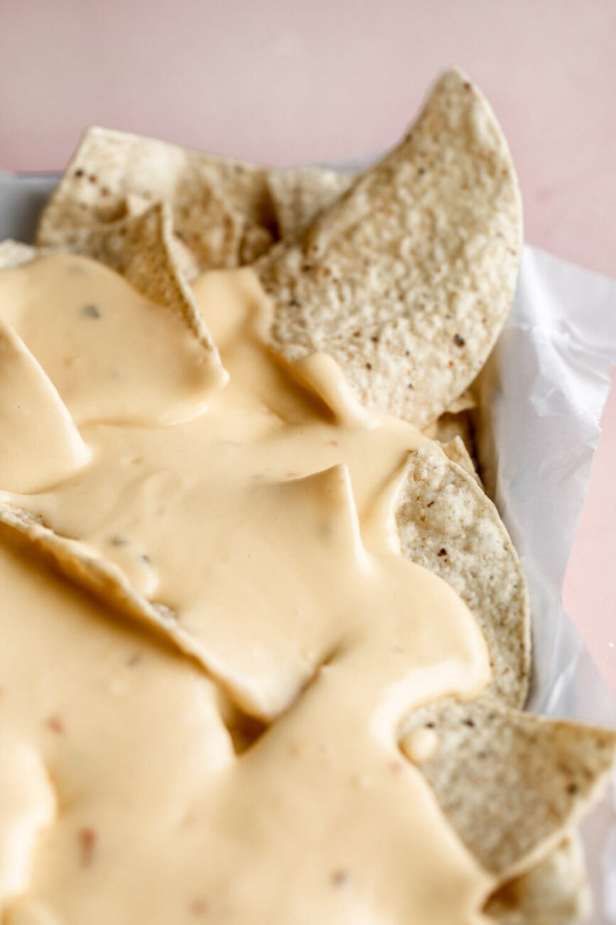 tortilla chips with nacho cheese.