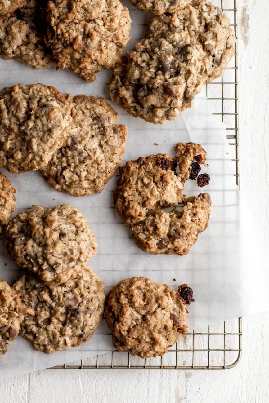 Oatmeal Cookies with Chocolate Covered Raisins on cooling rack.
