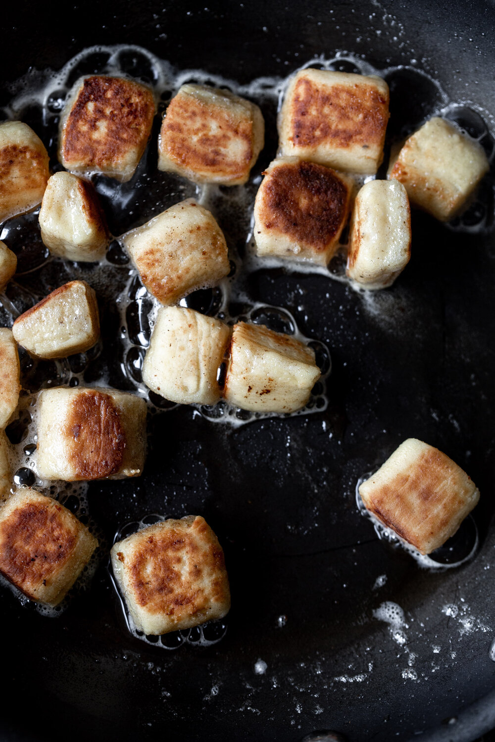 Pan-fried Ricotta Gnocchi in pan with crispy exterior