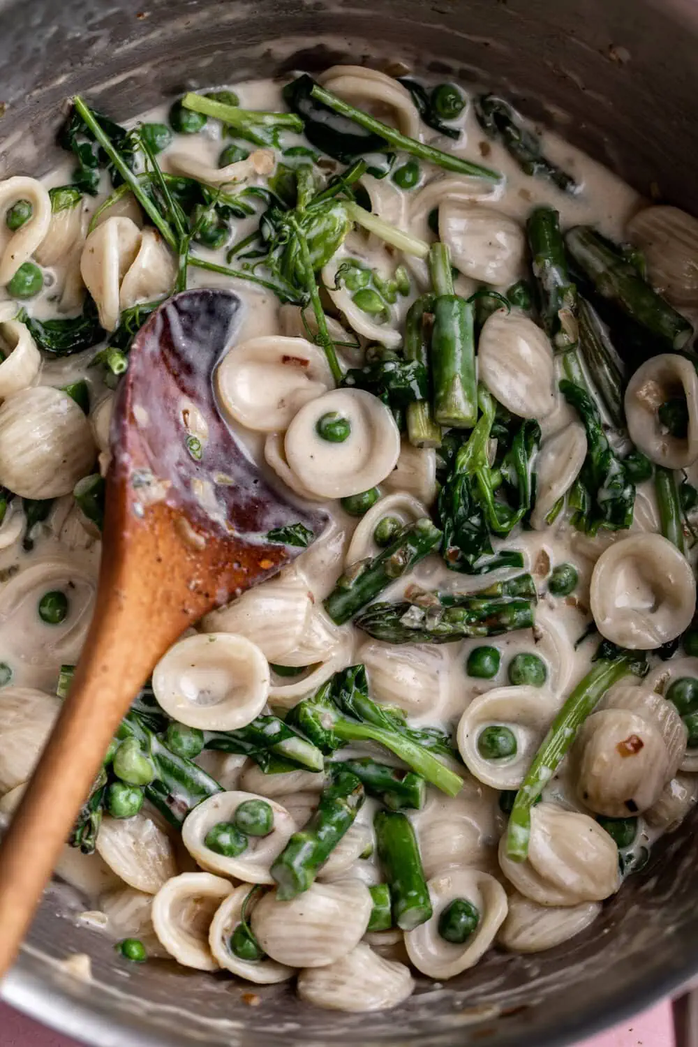 orecchiette Pasta with Gorgonzola, Asparagus & Pea Shoots in pot